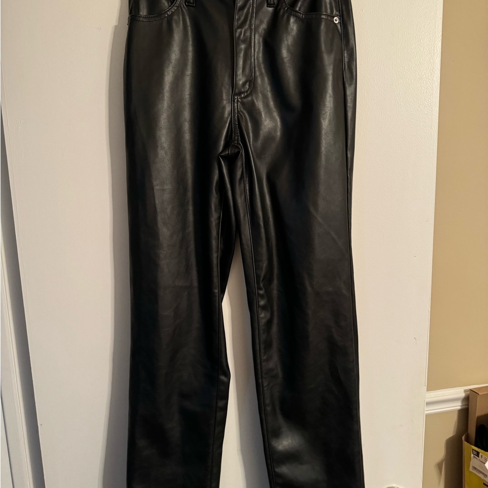 Black Leather Like pants. Never worn.